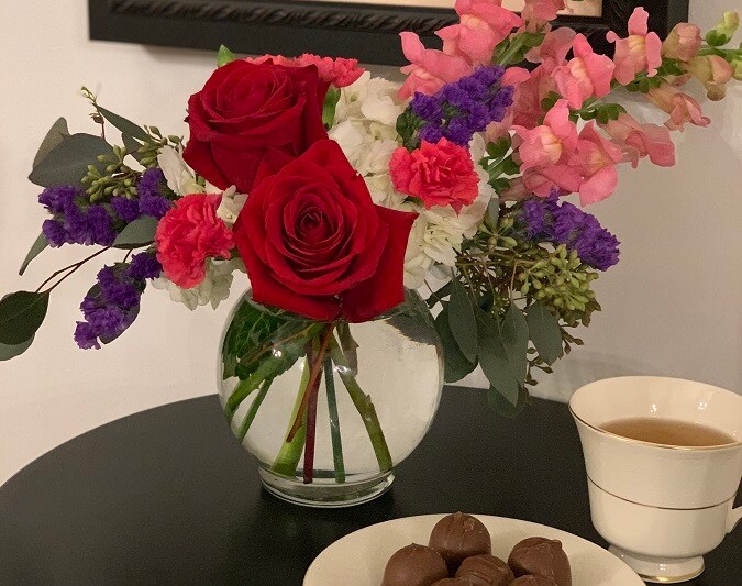 Vase with Red Roses